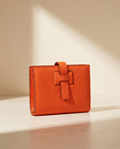 Le Portefeuille en cuir de vachette pleine fleur grainé, coloris Orange
