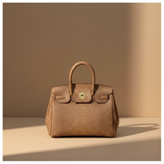 Héritage, sac rétro en cuir de vachette grain reptile, coloris Brun