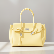 Opaline Butter — sac à main opaque en TPU mat, jaune beurre