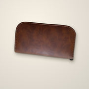 La Trousse d'entretien du cuir La Firkin, pochette zippée en cuir marron